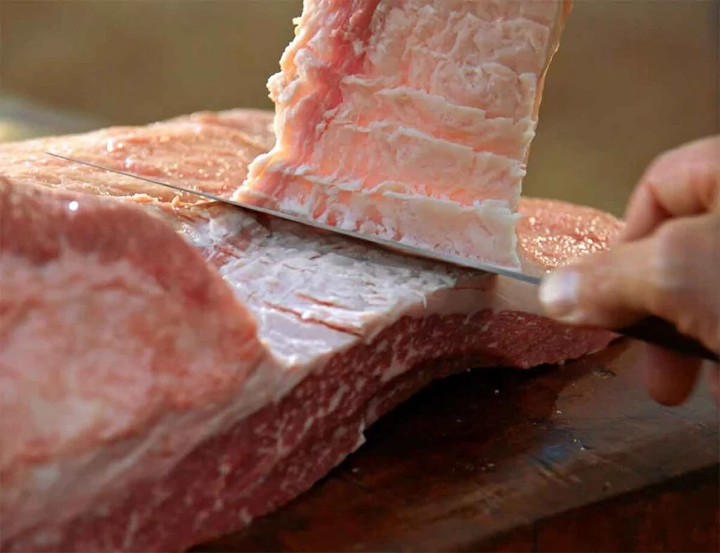 Aaron Franklin trimming a full packer brisket.