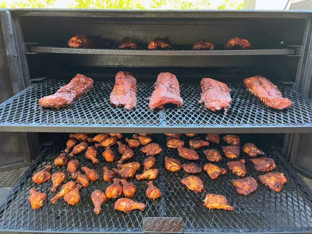 Wings and ribs on smoker at Southern Fusion.