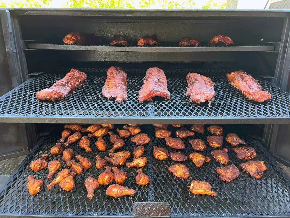 Wings and ribs on smoker at Southern Fusion.