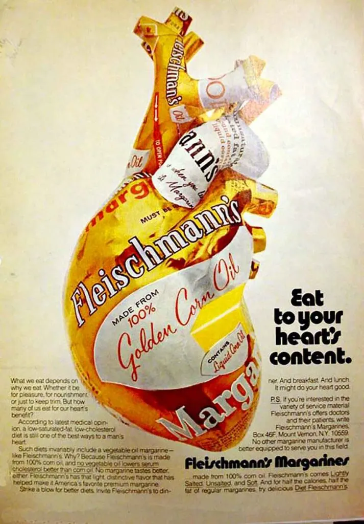 Advertisement from margarine company showing a heart wrapped in the protective barrier of a Flieschmann's wrapper.