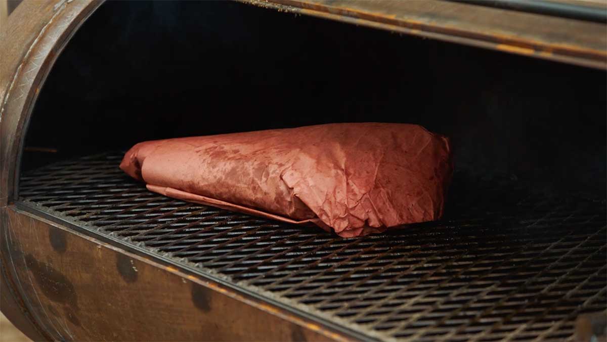 Brisket wrapped in butcher paper, aka Texas Crutch.
