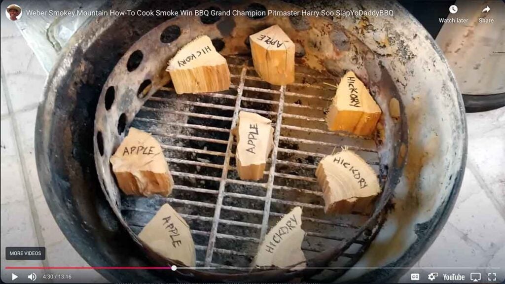 Harry Soo's arrangement of apple wood and hickory chunks in his Weber Kettle grill. These will be covered with charcoal.