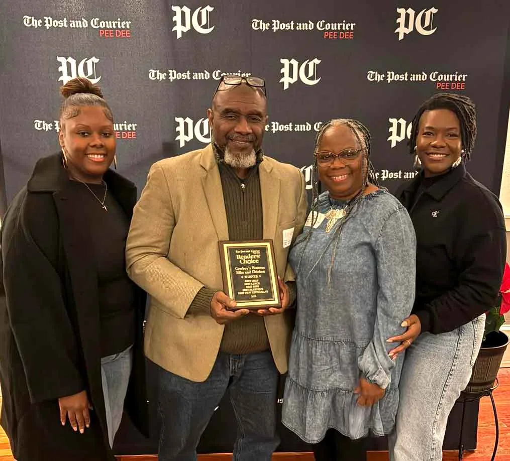 The Gordon family accepts the Post and Courier's Reader's Choice Award.