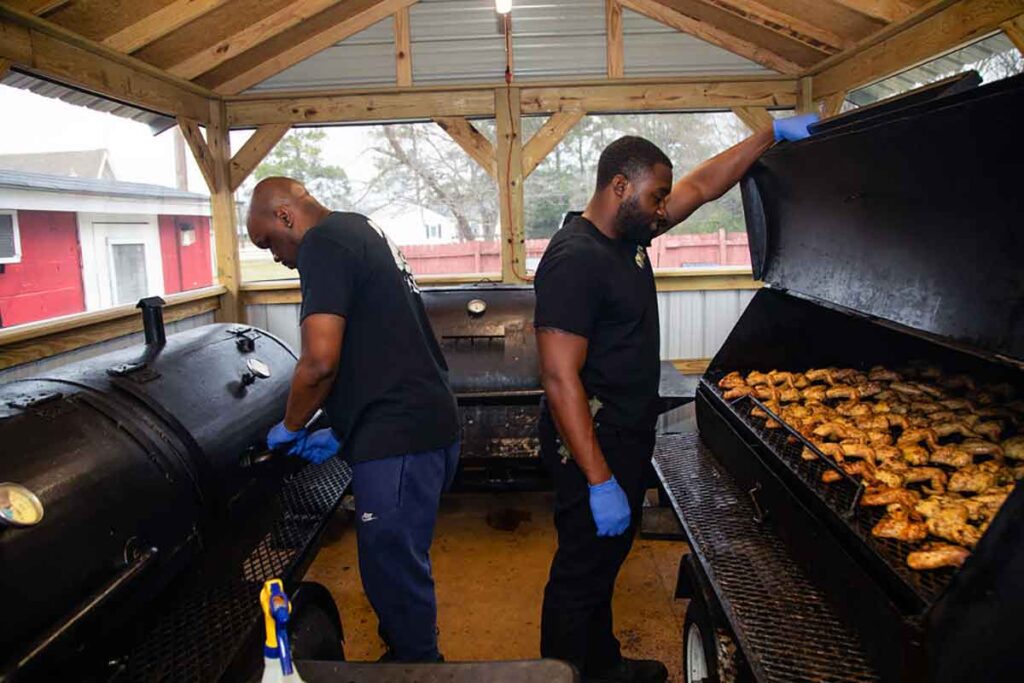 Workers manning the pits at Cowboy's.