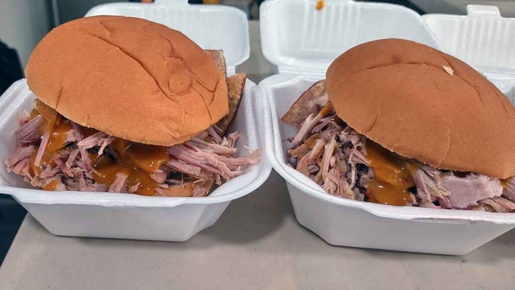 BBQ sandwiches in to-go trays.