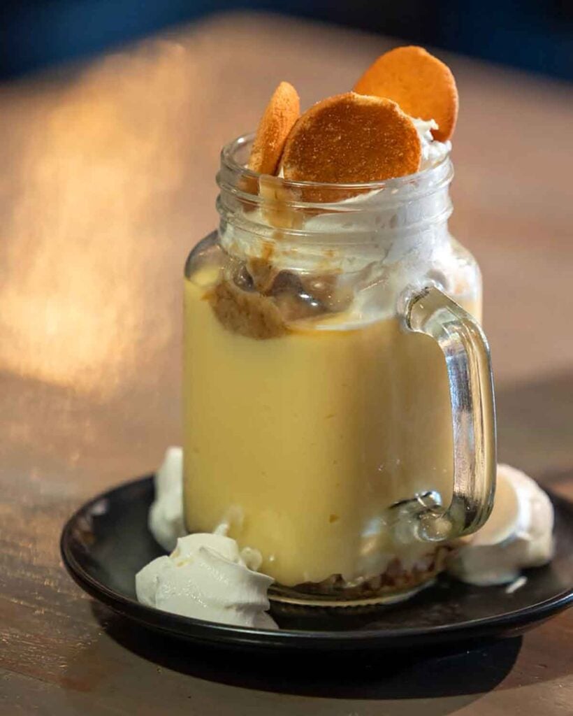 Mason jar filled with banana pudding.