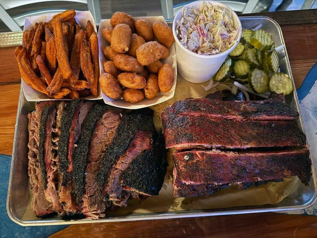 Ribs and brisket with sides.