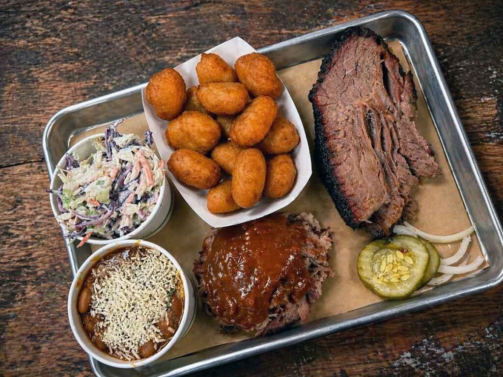Two meat tray with sides.