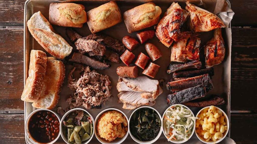 Sampler tray from City BBQ with all meats and sides.
