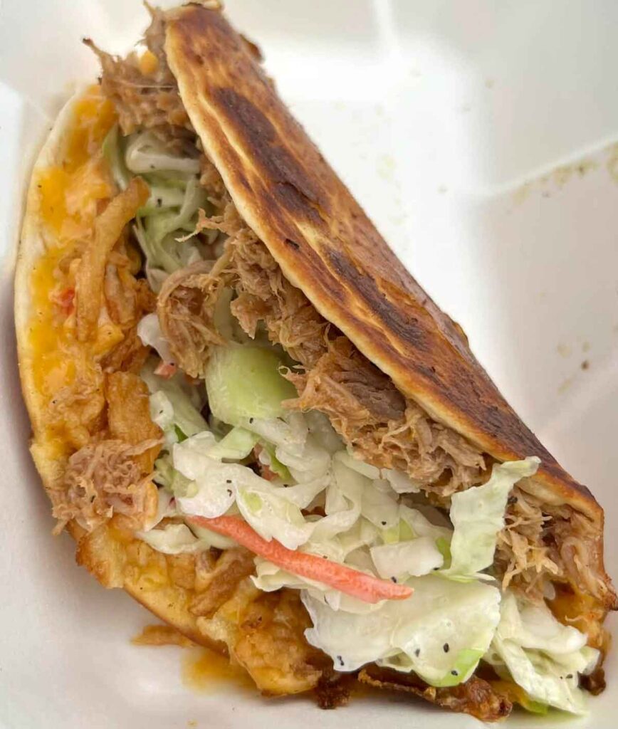 Pulled pork taco with slaw.