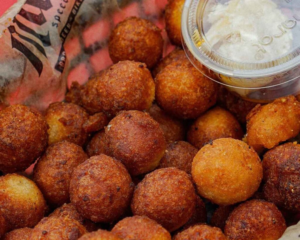 Hushpuppies with honey butter.
